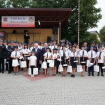 Powiększ zdjęcie Orkiestra,%20strażacy%20i%20zaproszeni%20goście